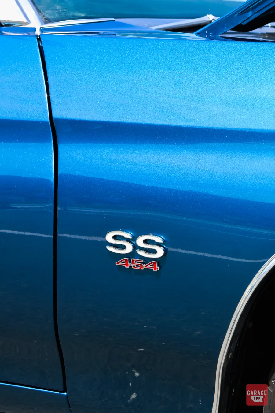 Close-up of the SS 454 fender emblem on a 1970 Chevrolet Chevelle SS finished in Fathom Blue metallic paint.