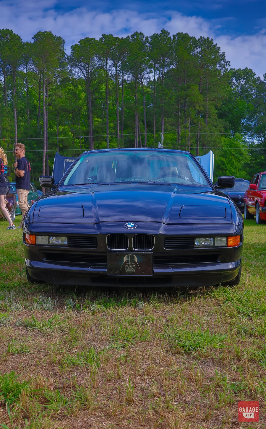 BMW 840Ci grand touring coupe displayed at a classic BMW show highlighting elegant E31 styling and V8 luxury performance.