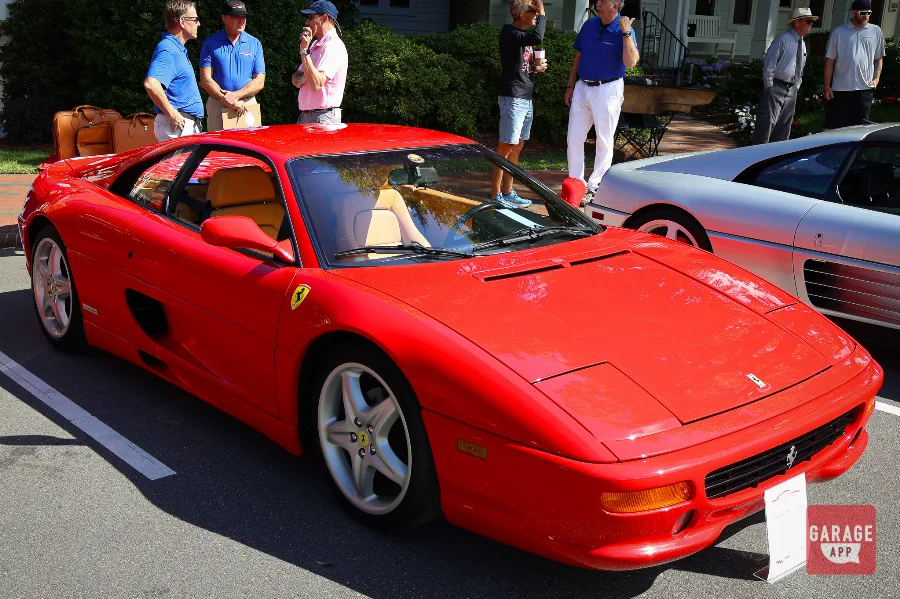 Red Ferrari F355 Berlinetta parked at a concours event in Pinehurst, North Carolina.