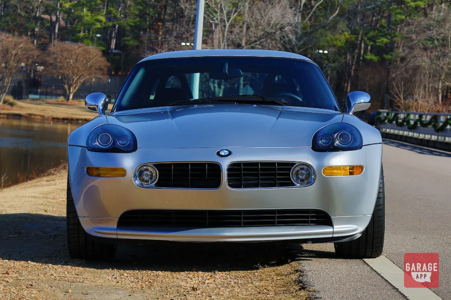Front view of a 2001 BMW Z8 in Titanium Silver Metallic, displaying the distinctive kidney grilles and retro-inspired design.
