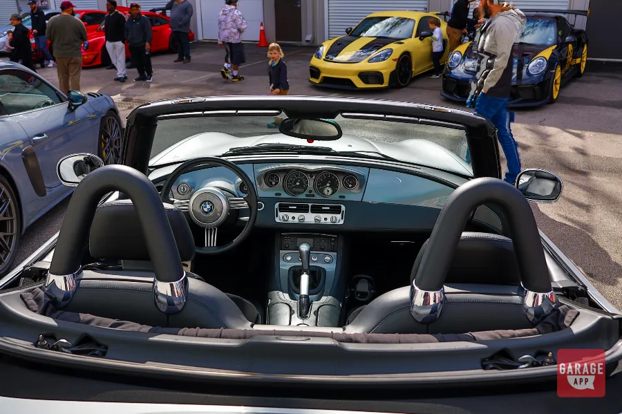 Interior of a 2001 BMW Z8 featuring premium leather upholstery, center-mounted gauges, and a driver-focused cockpit finished in classic BMW luxury.