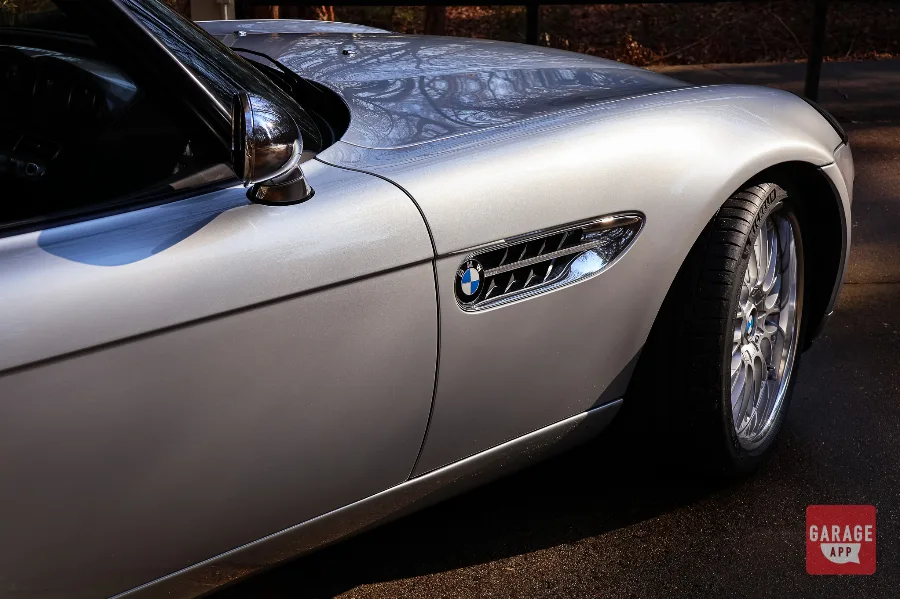 Close-up of the BMW Z8 side vent on a 2001 BMW Z8 in Titanium Silver Metallic, showcasing one of the roadster's signature design details.