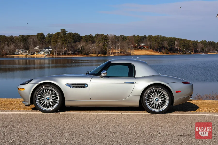 Side profile of a 2001 BMW Z8 in Titanium Silver Metallic, highlighting the timeless proportions and classic BMW roadster design.