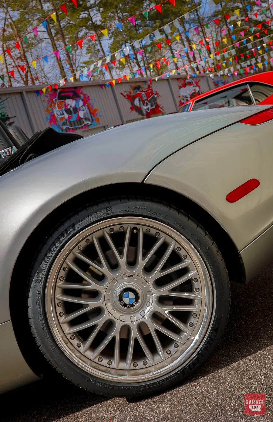 Close-up of the OEM BBS wheels on a 2001 BMW Z8 finished in Titanium Silver Metallic, showcasing the factory multi-spoke design, performance engineering, and timeless BMW craftsmanship.