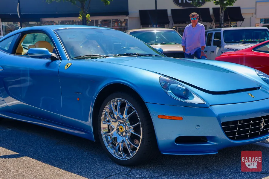 Close front three-quarter view of a 2008 Ferrari 612 Scaglietti displaying its front grille, alloy wheels, and naturally aspirated V12 grand touring design