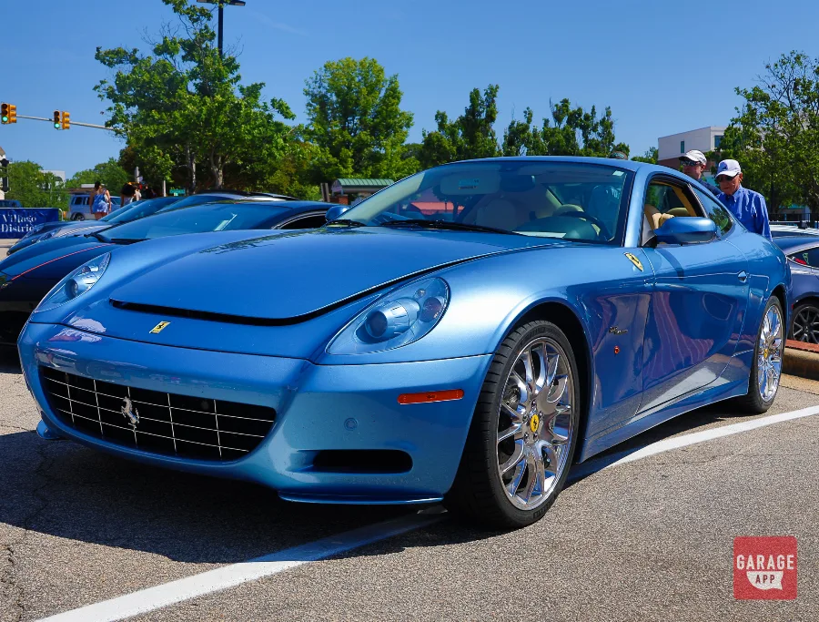 Front three-quarter view of a 2008 Ferrari 612 Scaglietti in Azzurro California showing the front grille, headlights, and Pininfarina body design