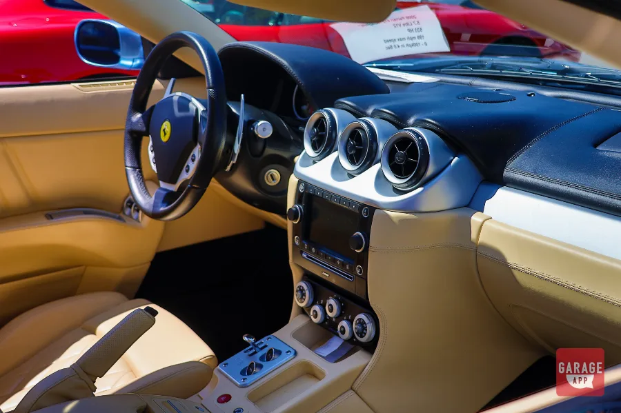 Ferrari 612 Scaglietti center console featuring F1 transmission controls, climate controls, and handcrafted leather surfaces