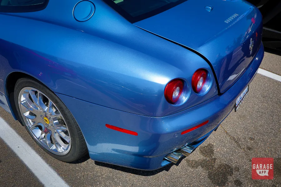 Close-up of Ferrari 612 Scaglietti taillights and rear body lines showing the craftsmanship of Ferrari's aluminum grand touring platform