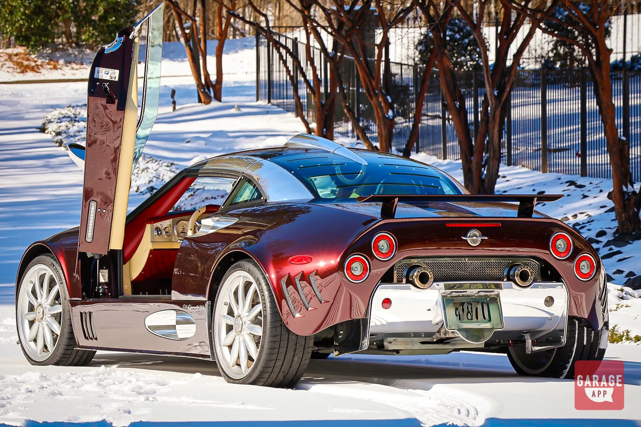 Spyker scissor door open in snow