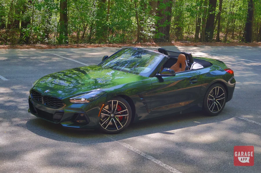 BMW Z4 M40i manual in San Remo Green parked outdoors, highlighting one of BMW's most engaging modern sports cars.