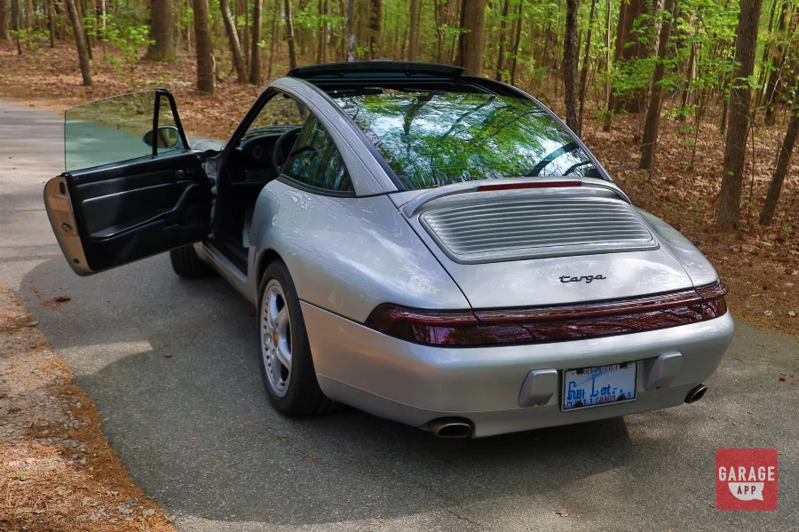Porsche 993 Targa parked outdoors, showcasing one of the most desirable air-cooled Porsche 911 models.