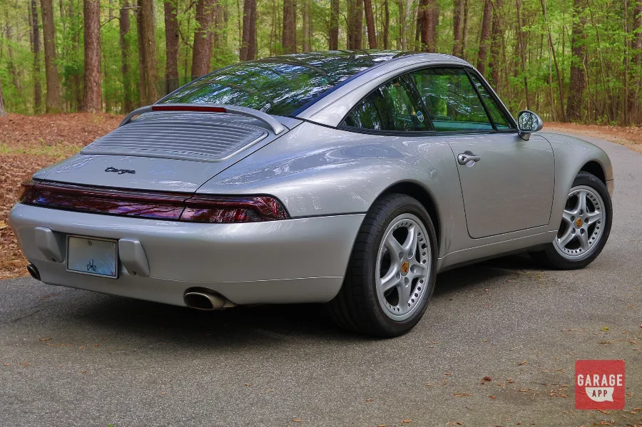 Rear view of a Porsche 993 Targa featuring the full-width reflector and classic 911 rear-end design.