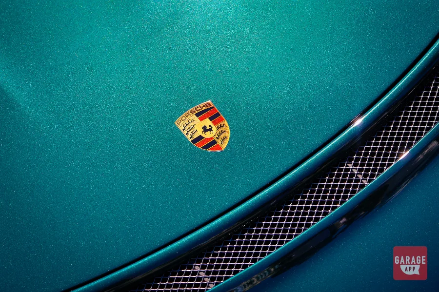 Front close-up of a Porsche 911 Speedster showing the LED headlights, front bumper details, and racing-inspired design.