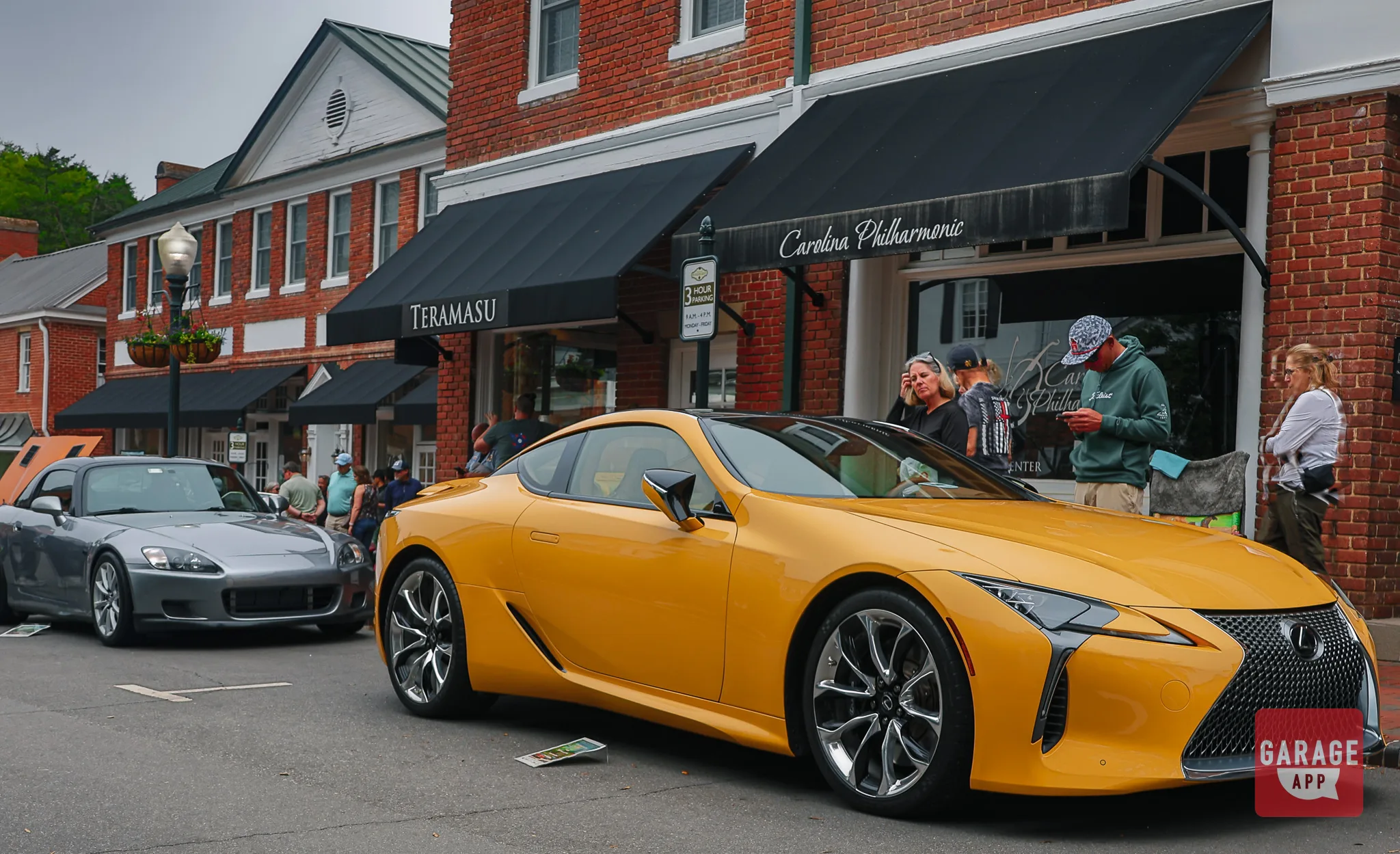 Front three-quarter view of a Lexus LC 500 showcasing its naturally aspirated V8 engine and distinctive grand touring design.