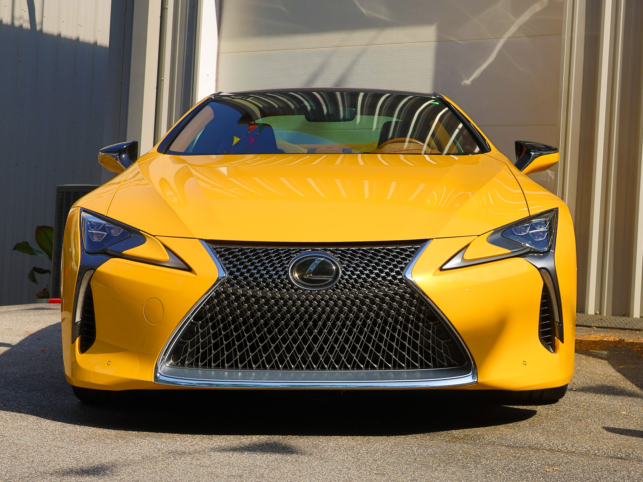 Front view of a Lexus LC 500 displaying the bold spindle grille and aggressive styling.