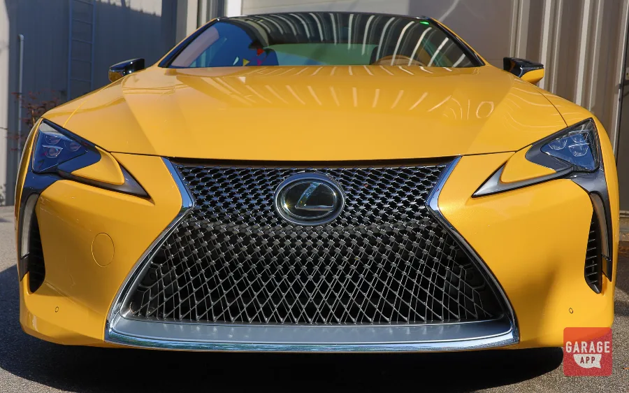Front view of a Lexus LC 500 displaying the bold spindle grille and aggressive styling.