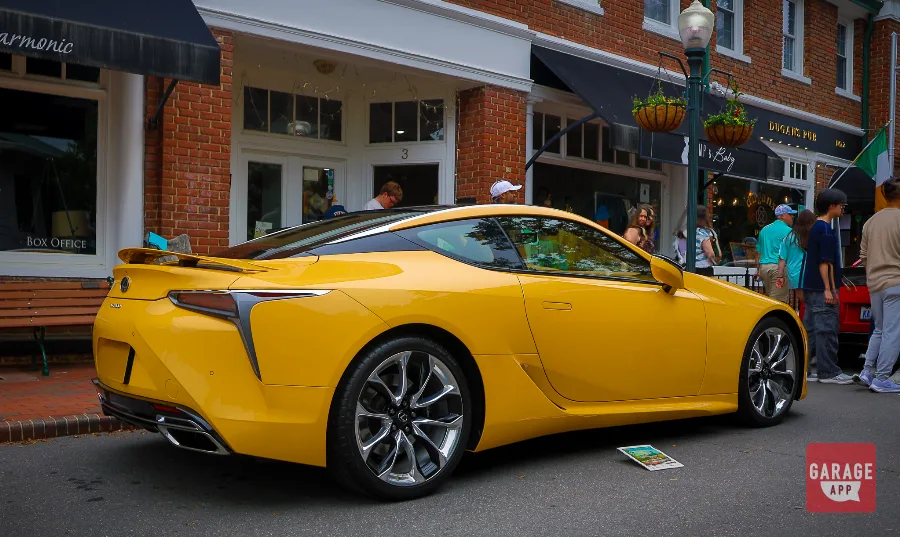 Rear view of a Lexus LC 500 showcasing the dual exhaust outlets and aerodynamic rear styling.