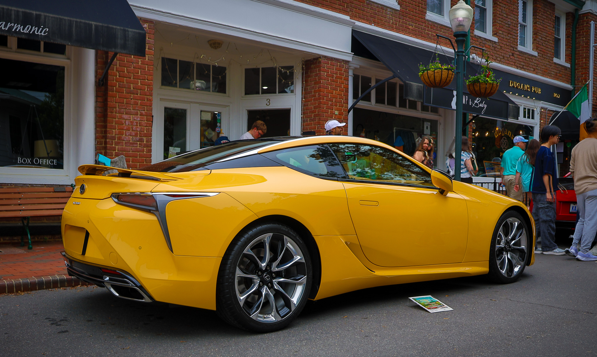 Rear view of a Lexus LC 500 showcasing the dual exhaust outlets and aerodynamic rear styling.