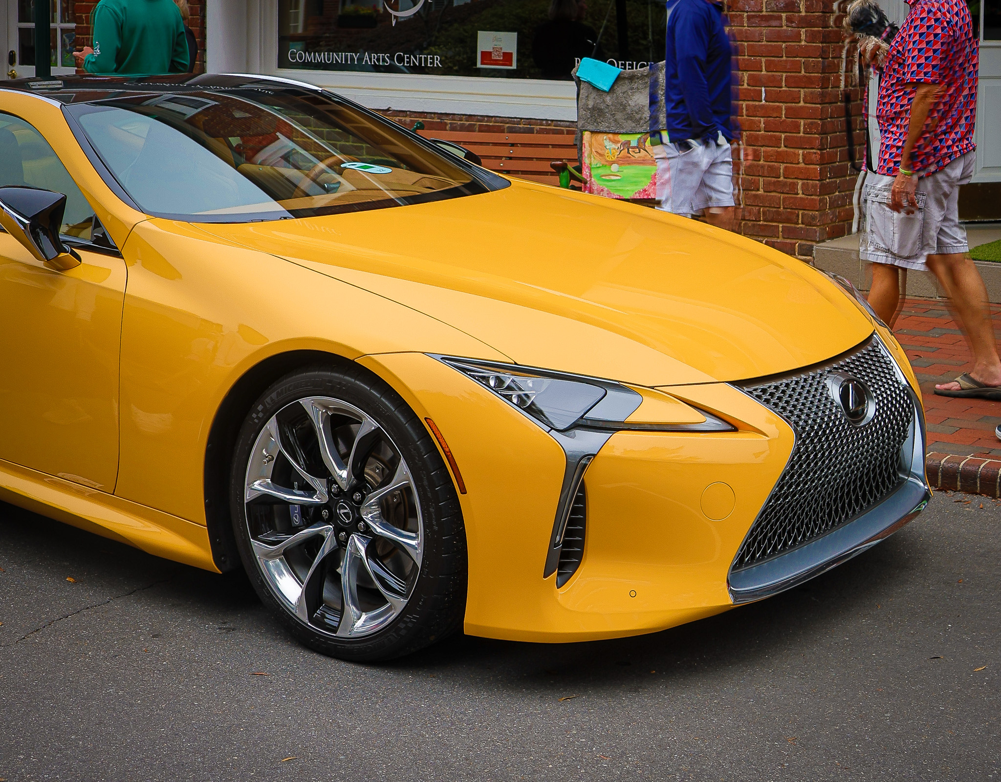 Lexus LC 500 front three-quarter view showing the spindle grille and low wide stance