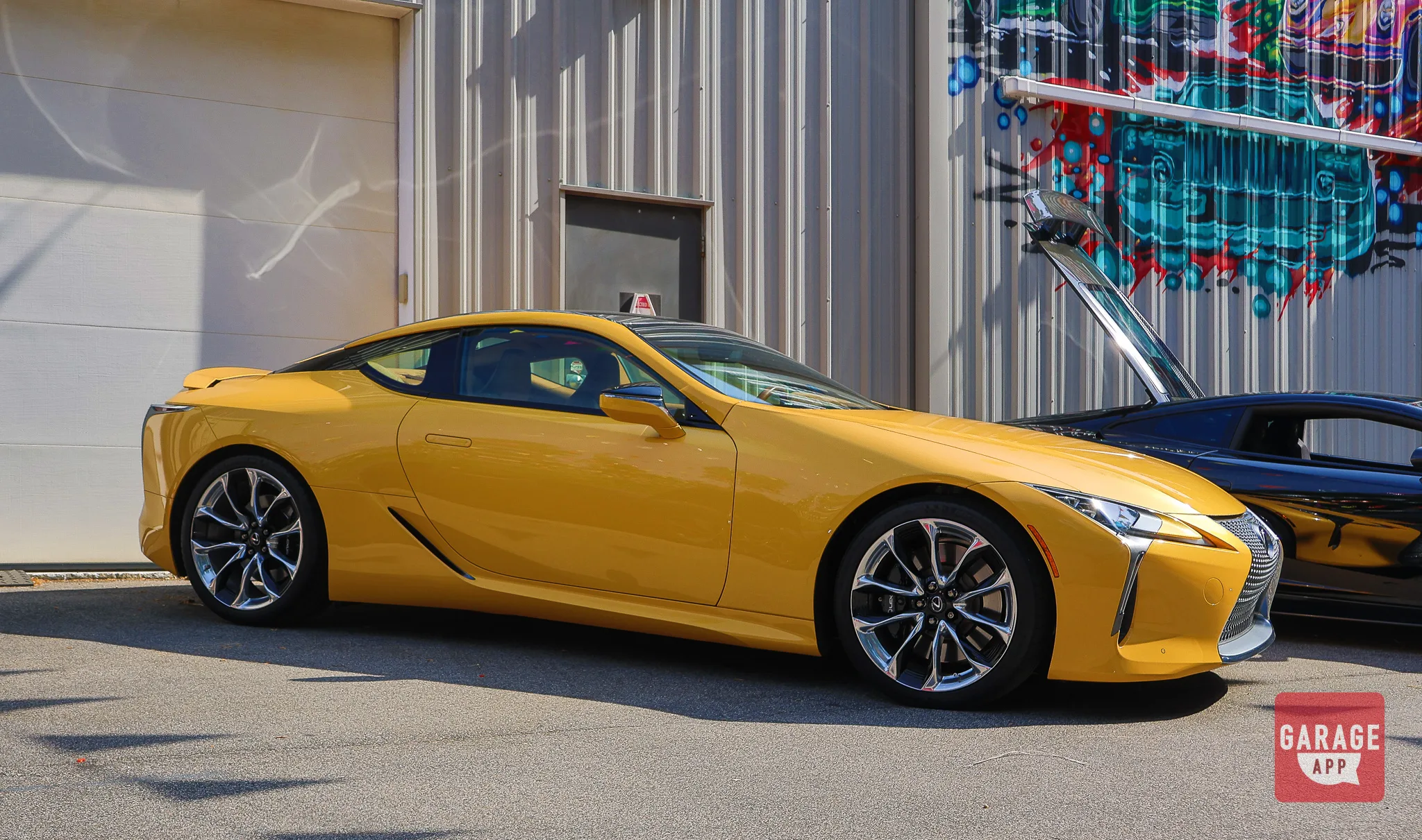 Front three-quarter view of a Lexus LC 500 showcasing its naturally aspirated V8 engine and distinctive grand touring design.