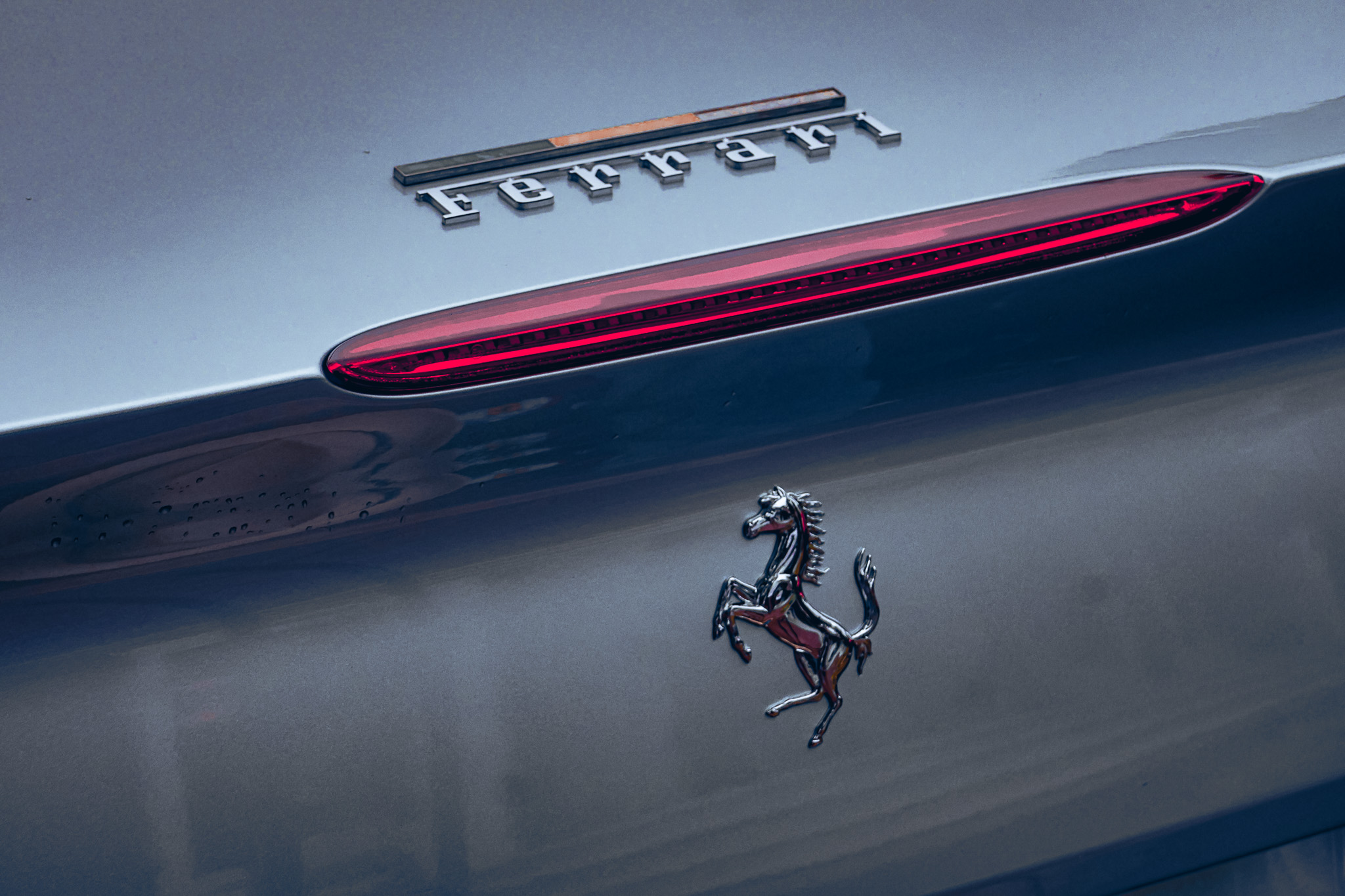 Ferrari script lettering on the rear of a 2019 Ferrari Portofino