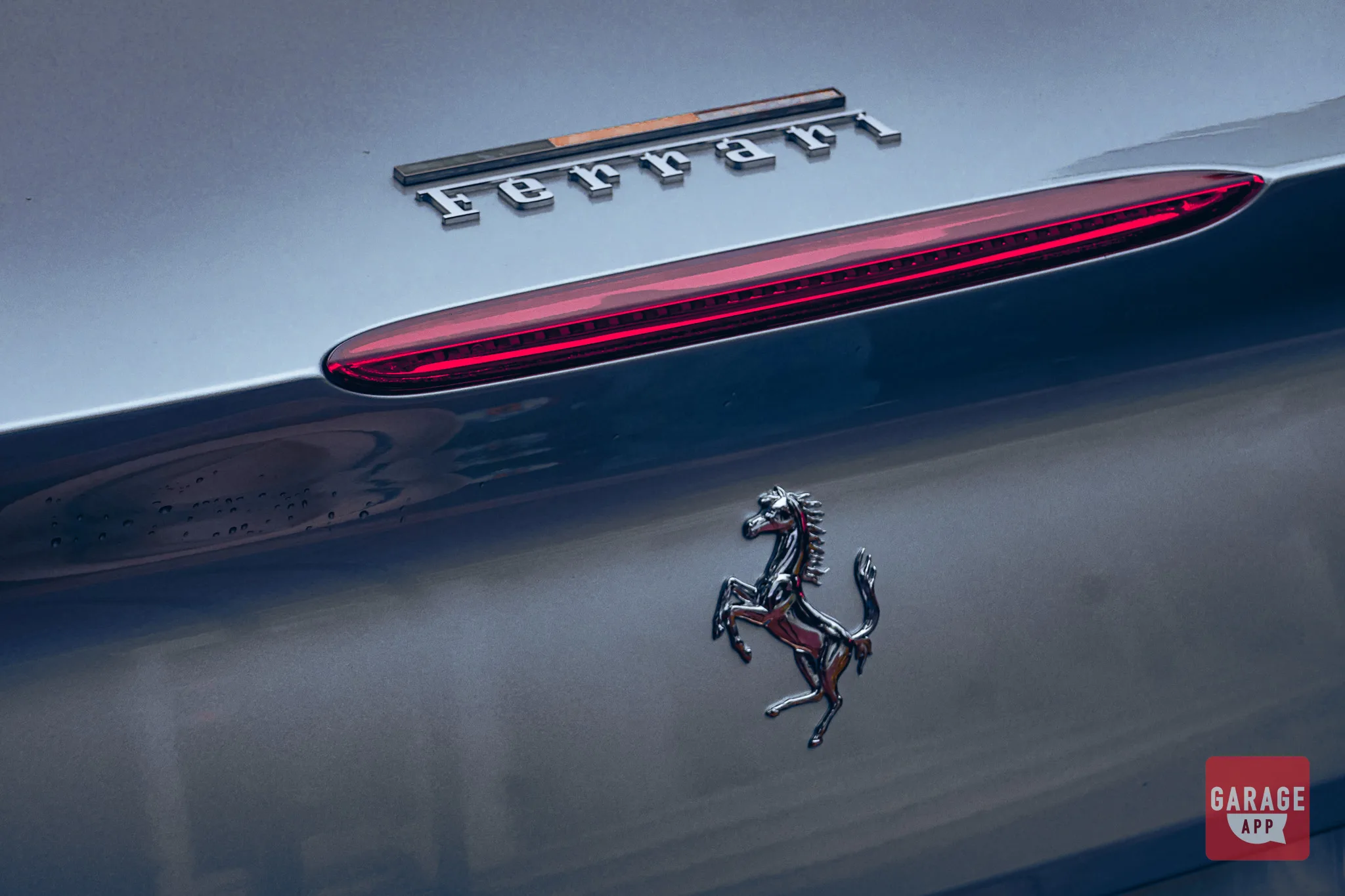 Ferrari script lettering on the rear of a 2019 Ferrari Portofino