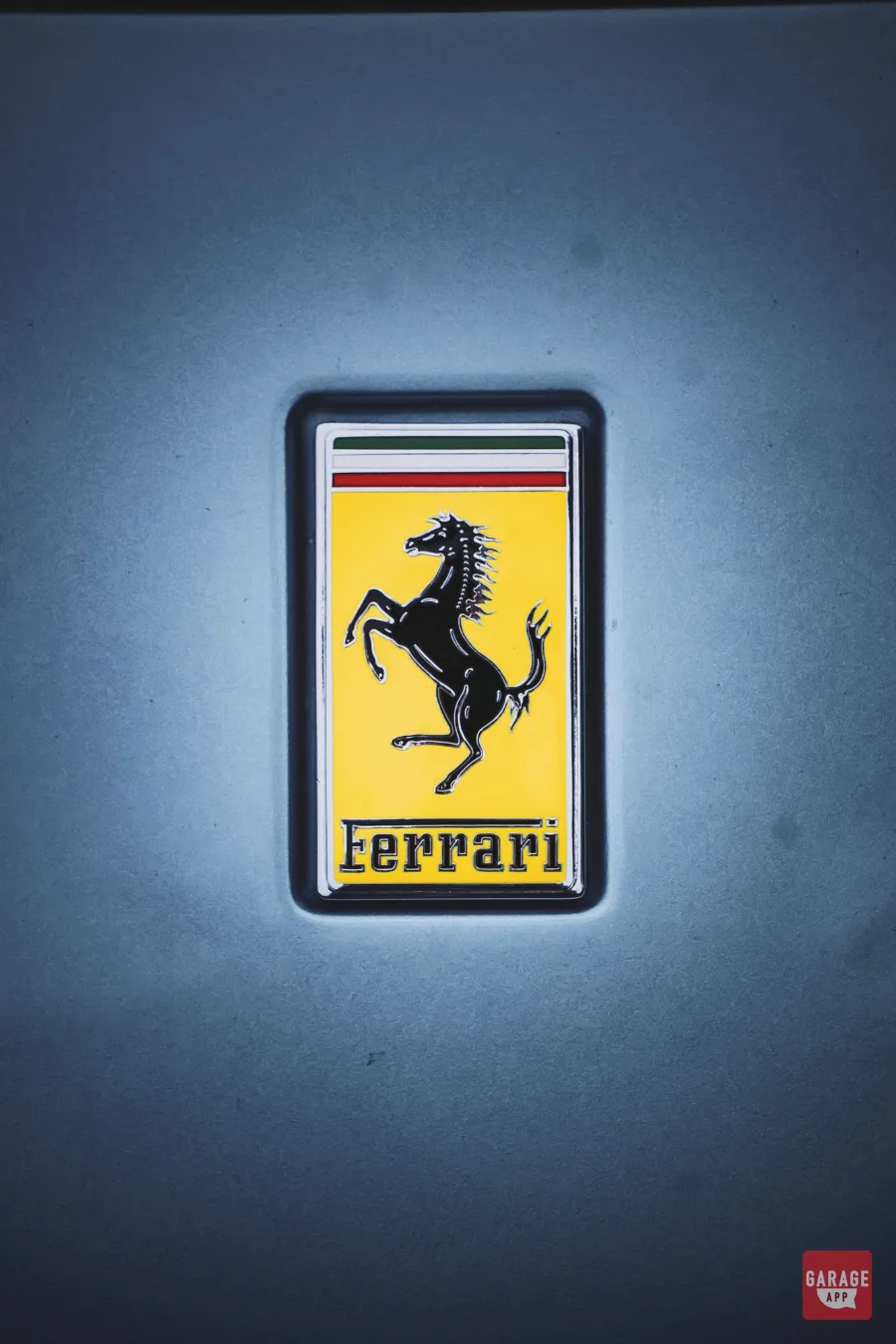 The iconic Ferrari prancing horse badge mounted on the side fender of this Ferrari Portofino.