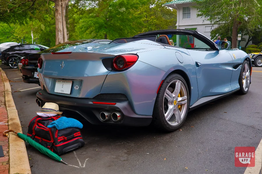 Rear three-quarter photograph of a 2019 Ferrari Portofino displaying the wide rear stance and signature taillight design.