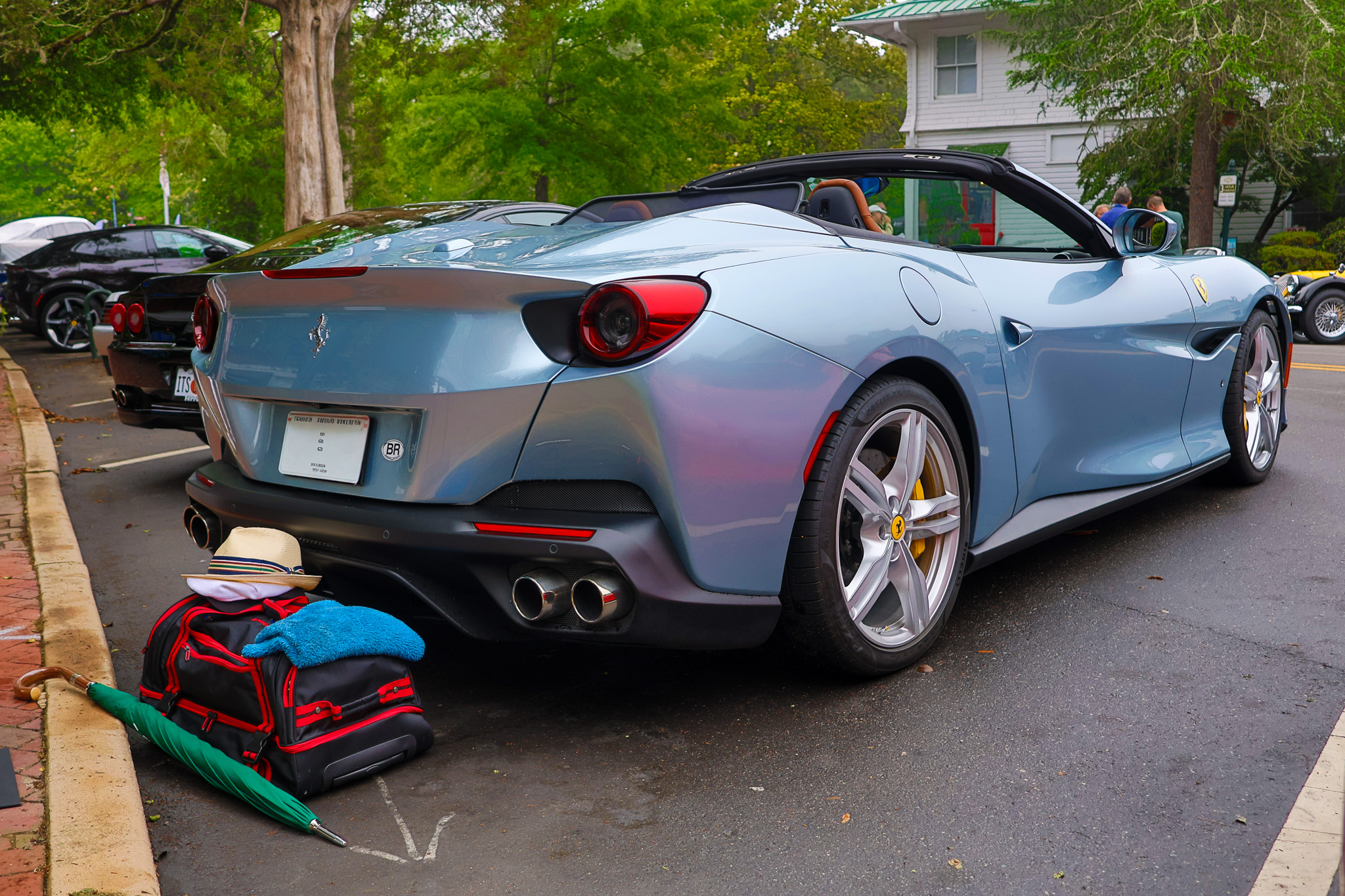 Rear three-quarter photograph of a 2019 Ferrari Portofino displaying the wide rear stance and signature taillight design.