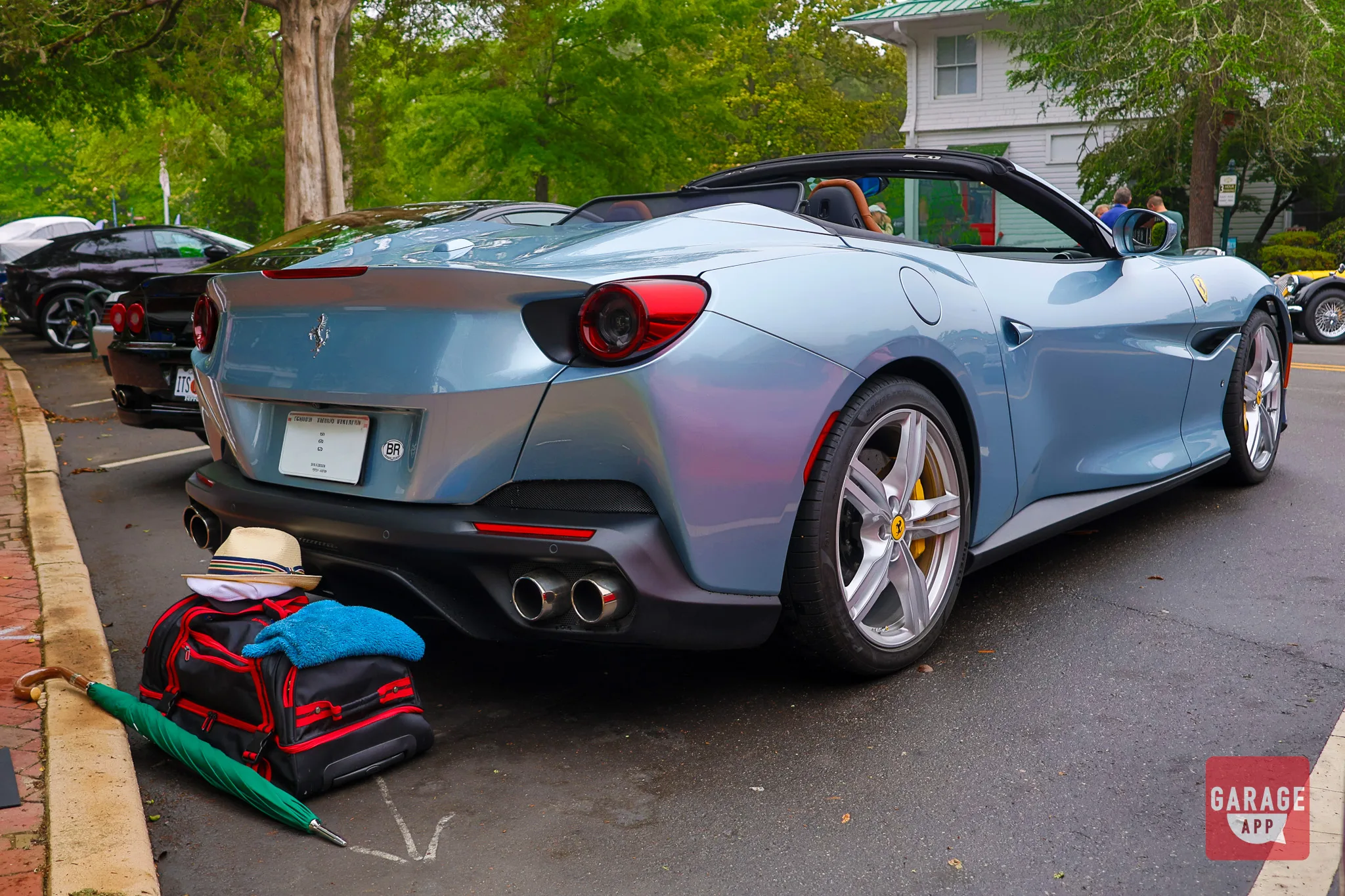 Rear three-quarter photograph of a 2019 Ferrari Portofino displaying the wide rear stance and signature taillight design.