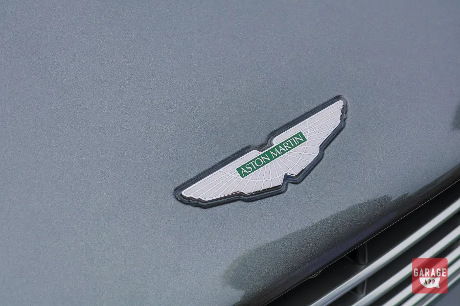 Aston Martin wings badge hood emblem close-up
