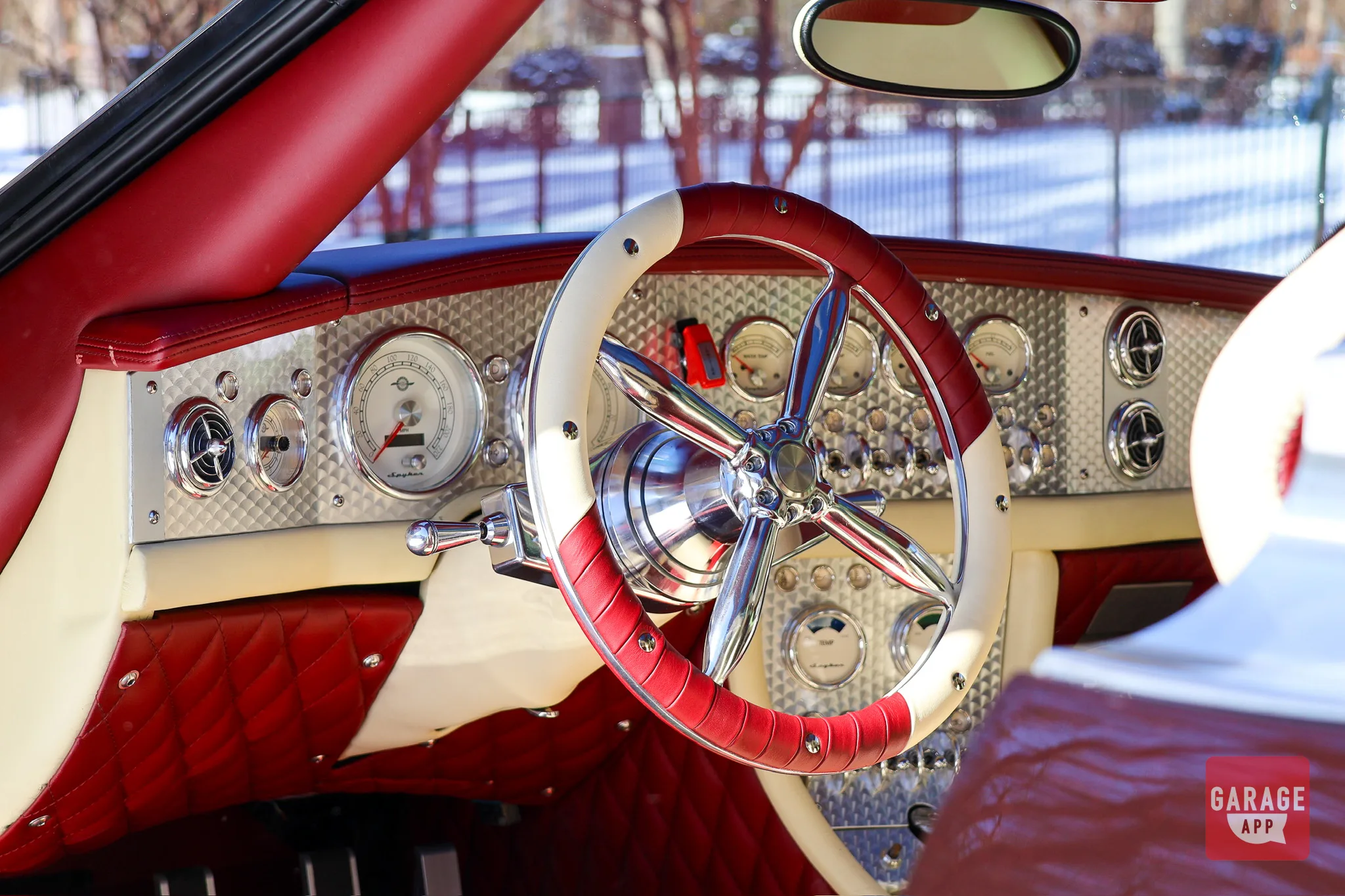Spyker C8 polished aluminum dashboard close-up