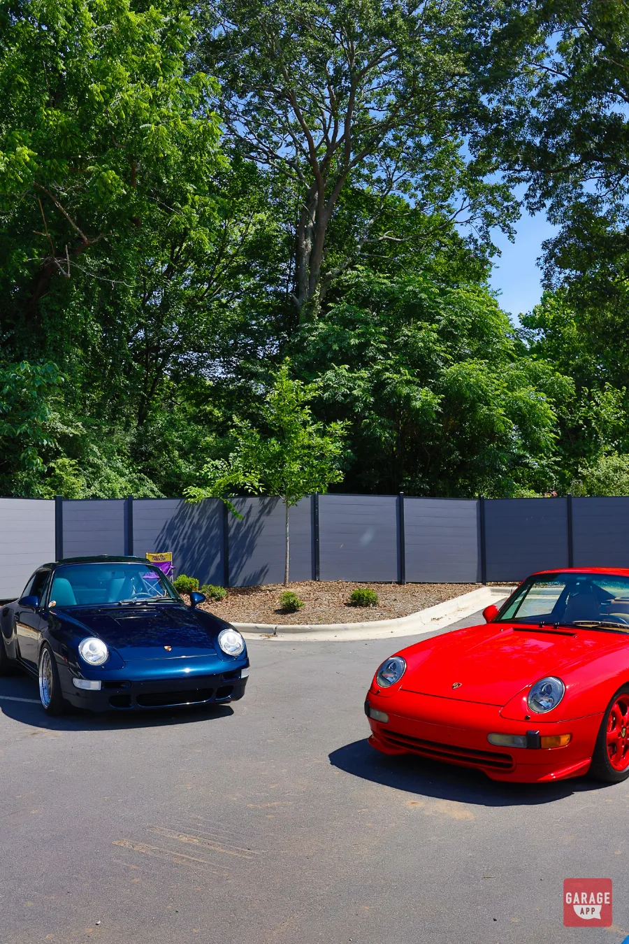 Air-cooled Porsche 911 models displayed together at a Porsche enthusiast event showcasing iconic sports car heritage.
