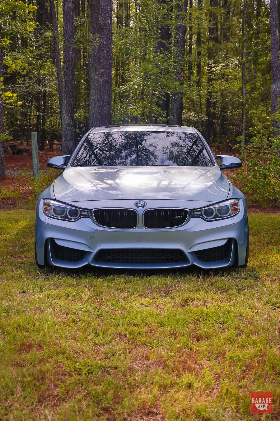 BMW F82 M4 performance coupe showcased at a BMW meet featuring aggressive styling and twin-turbo M performance.