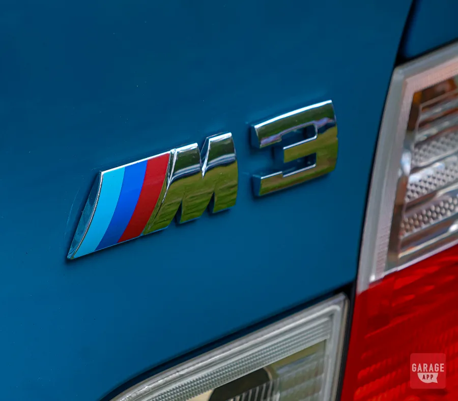 Close-up of the Laguna Seca Blue paint finish on a 2005 BMW M3 highlighting the vibrant factory color.