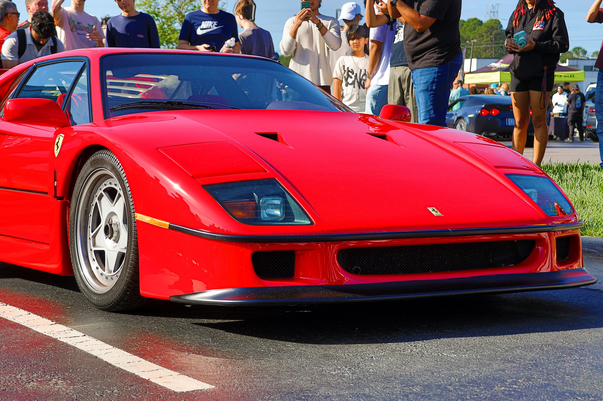 Red Ferrari F40 front fascia and headlight detail closeup