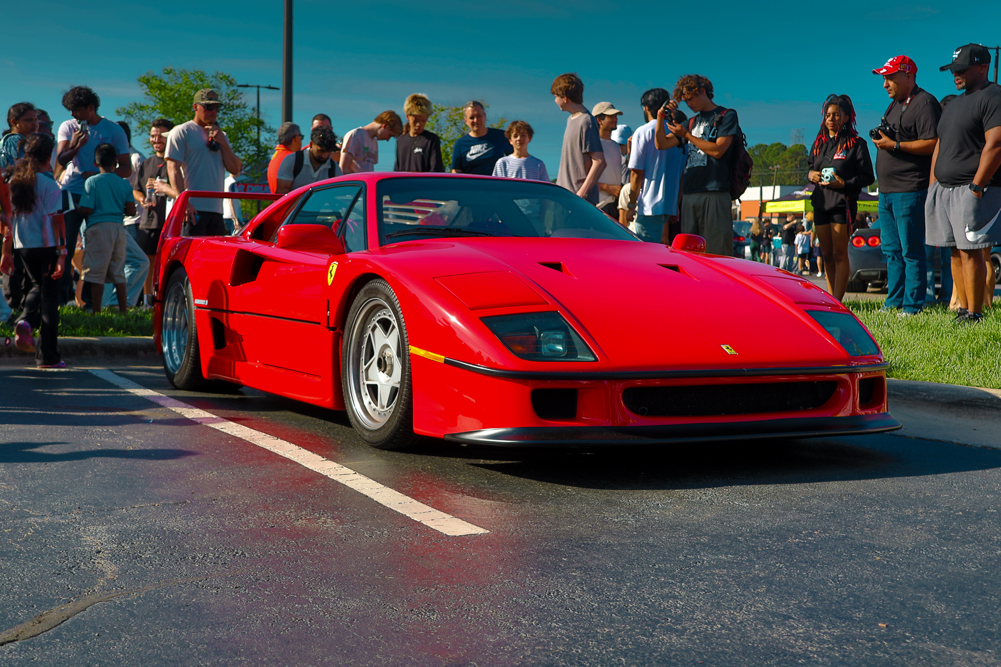 Red Ferrari F40 front three-quarter view at Cars and Coffee North Carolina