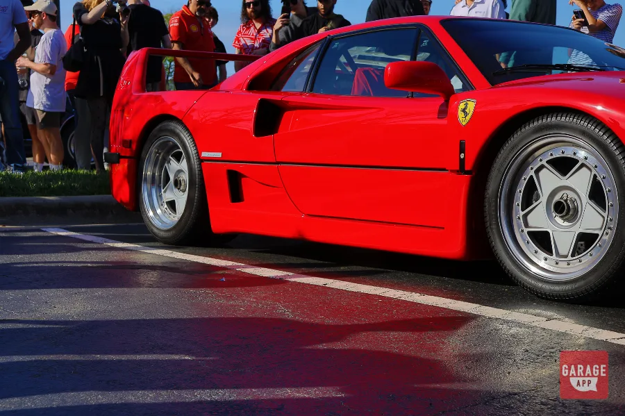 Ferrari F40 side profile with Ferrari badge closeup