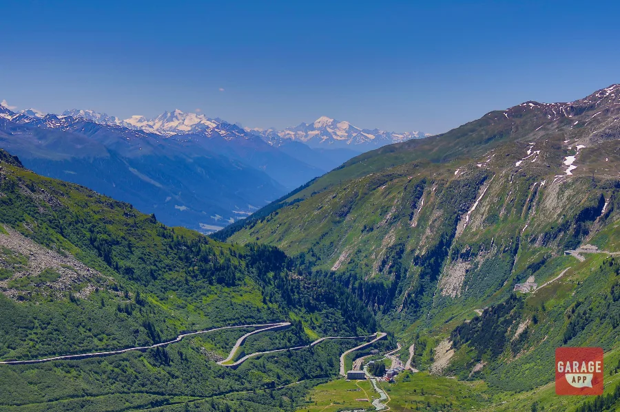 Furka Pass hairpin switchbacks aerial view Swiss Alps