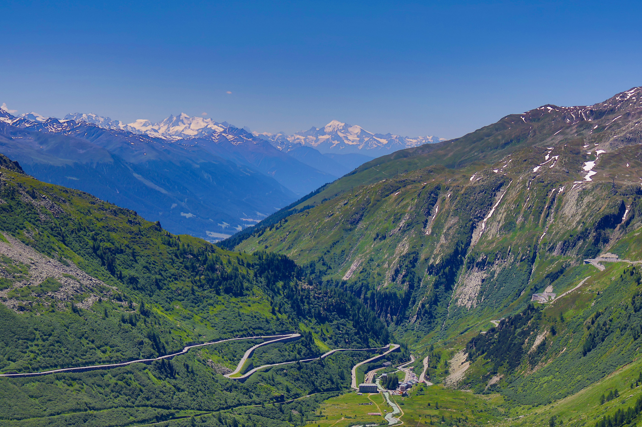 Furka Pass hairpin switchbacks aerial view Swiss Alps