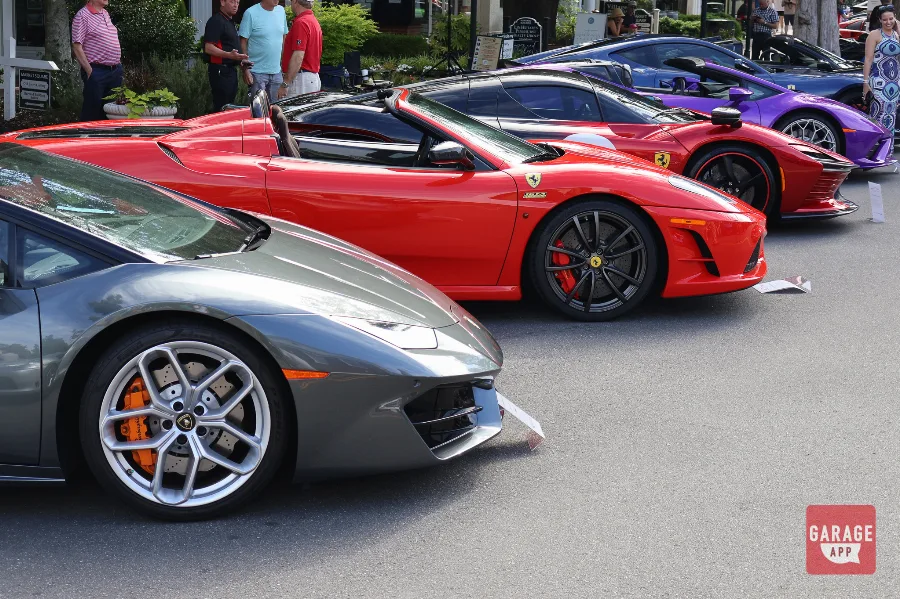Gray Lamborghini Huracan red Ferrari F430 side view Sandhills Motoring Expo