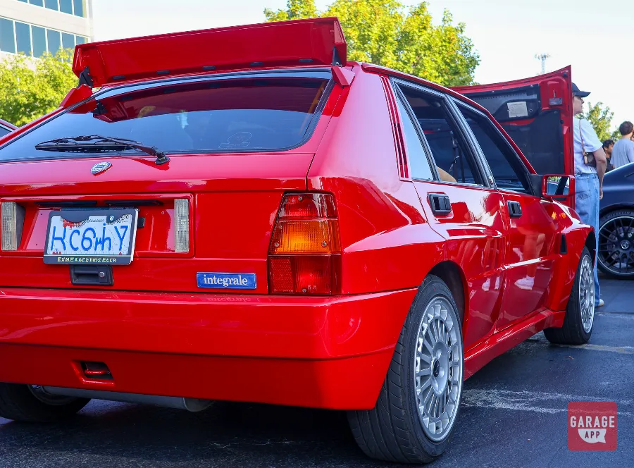 Red Lancia Delta HF Integrale parked at a North Carolina cars and coffee