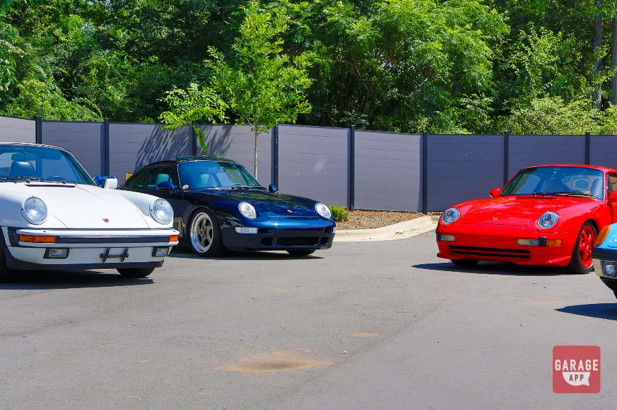 Classic Porsche 911s and Porsche 914/6 gathered together during Fuquay-Varina Cars and Coffee in North Carolina.