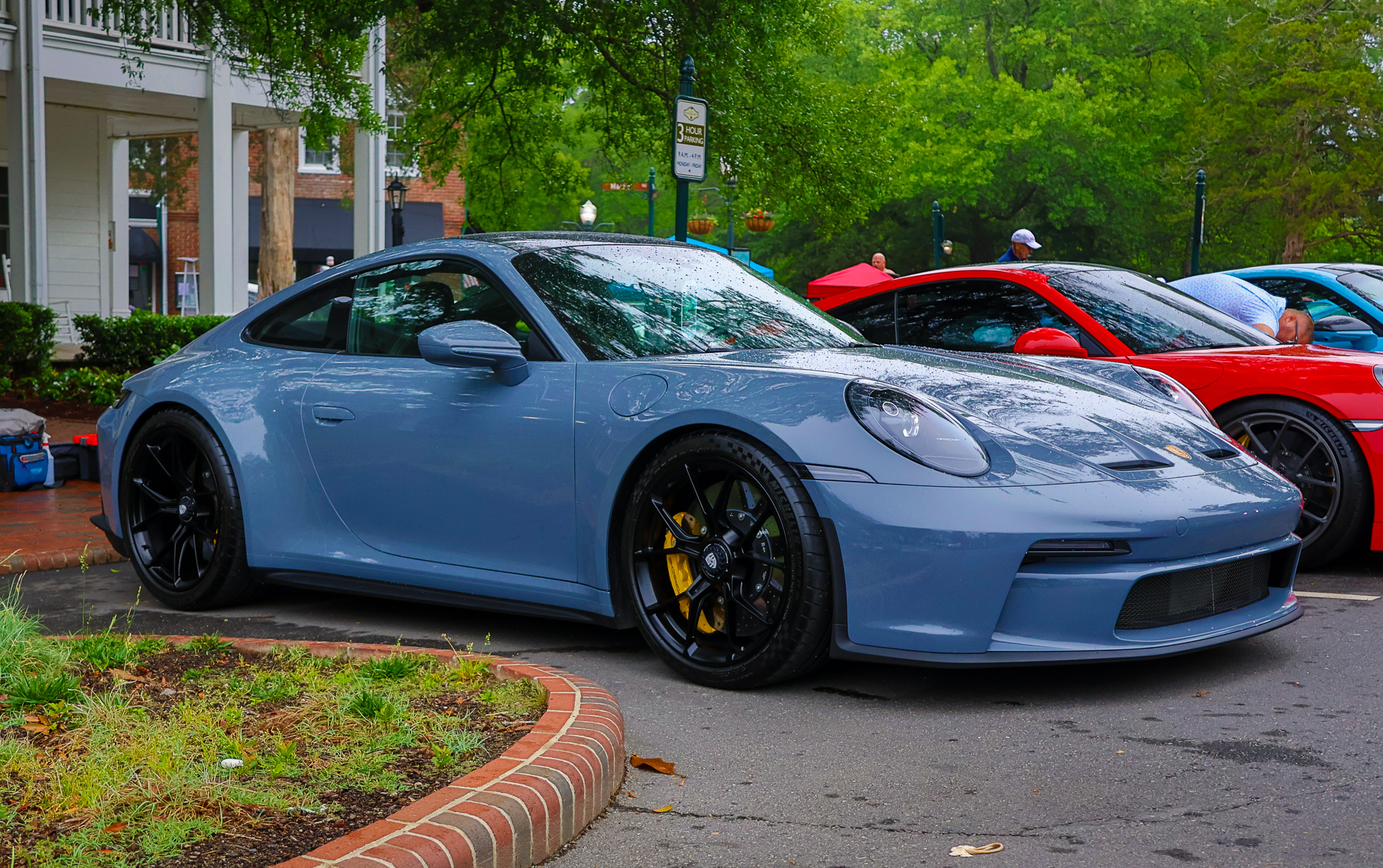 Slate blue Porsche 911 GT3 Touring front three-quarter view Sandhills Motoring Expo