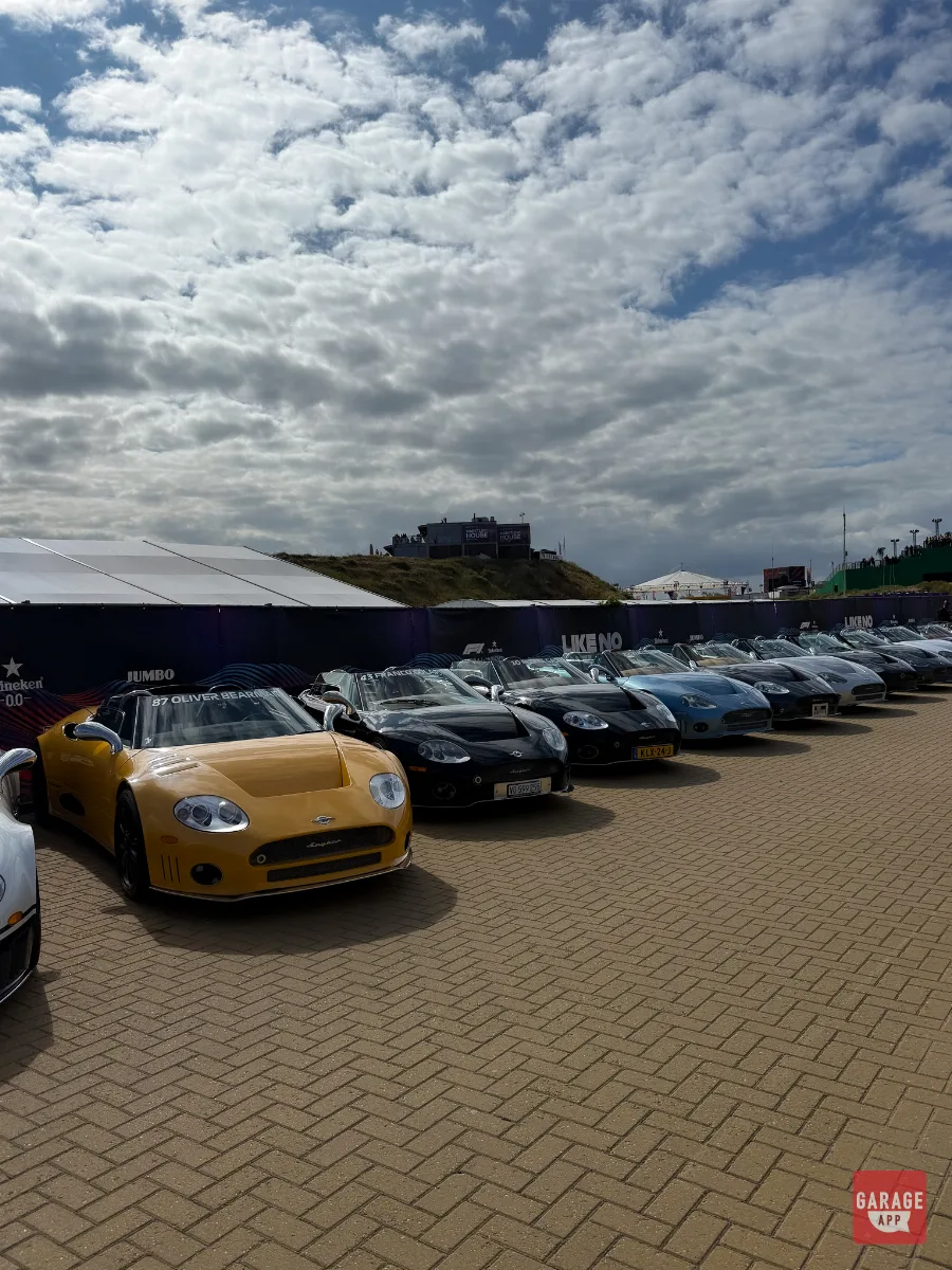 Row of Spyker C8 parade cars lined up in Zandvoort paddock